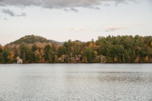 lake near forest in mountainous terrain